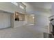 Inviting living room area featuring high ceilings, and seamlessly connects to the dining space and modern kitchen at 3145 E Flamingo Rd # 2080, Las Vegas, NV 89121
