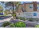 Laguna Palms Condominiums sign with lush landscaping at community entrance at 3145 E Flamingo Rd # 2080, Las Vegas, NV 89121