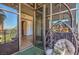 Balcony with woven hanging chair and view into open sliding glass doors at 353 E Bonneville Ave # 379, Las Vegas, NV 89101
