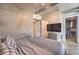 Bedroom featuring a modern aesthetic, closet, and a mounted television at 353 E Bonneville Ave # 379, Las Vegas, NV 89101