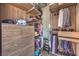 Custom walk-in closet with built-in shelving and drawer storage, providing optimal organization at 353 E Bonneville Ave # 379, Las Vegas, NV 89101