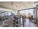 Community gym featuring weight training machines and a large window with views of the city at 353 E Bonneville Ave # 379, Las Vegas, NV 89101