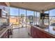 Bright kitchen featuring large windows, stainless appliances, and sleek countertops at 353 E Bonneville Ave # 379, Las Vegas, NV 89101