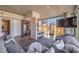 Open-concept living space with city views, modern furnishings, and a seamless kitchen access at 353 E Bonneville Ave # 379, Las Vegas, NV 89101