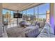 Inviting living room with large windows providing city views and a spacious seating area at 353 E Bonneville Ave # 379, Las Vegas, NV 89101