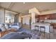 Bright open concept living space with modern kitchen, concrete ceilings and large windows at 353 E Bonneville Ave # 379, Las Vegas, NV 89101