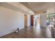 Living room with wood floors, modern lighting, and a bright window providing city views at 353 E Bonneville Ave # 379, Las Vegas, NV 89101