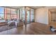 Cozy living room area that includes outdoor balcony views and natural light that is refreshing at 353 E Bonneville Ave # 379, Las Vegas, NV 89101