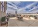 Stunning rooftop deck featuring comfortable seating and views of the city skyline at 353 E Bonneville Ave # 379, Las Vegas, NV 89101