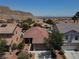 Aerial view of a neighborhood showcasing the property's location with mountain views at 4020 Driscoll Mountain St, Las Vegas, NV 89129