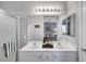 Modern bathroom featuring double sinks, vanity, and glass shower at 4020 Driscoll Mountain St, Las Vegas, NV 89129