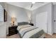 Cozy bedroom features a queen bed, ceiling fan and closet at 4020 Driscoll Mountain St, Las Vegas, NV 89129