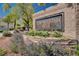 Close up of neighborhood entrance sign, featuring desert landscaping at 4020 Driscoll Mountain St, Las Vegas, NV 89129