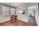 Cozy dining area with modern lighting, hardwood floors and easy access to the kitchen at 4020 Driscoll Mountain St, Las Vegas, NV 89129