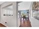 Bright dining room with hardwood floors, modern lighting and easy access to the kitchen at 4020 Driscoll Mountain St, Las Vegas, NV 89129