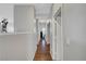 Hallway with hardwood floors leading to additional rooms at 4020 Driscoll Mountain St, Las Vegas, NV 89129