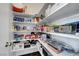 Walk-in pantry equipped with floor to ceiling shelving providing ample storage at 4020 Driscoll Mountain St, Las Vegas, NV 89129