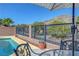 Backyard features a sparkling pool with mountain views, perfect for hot summer days and outdoor enjoyment at 4020 Driscoll Mountain St, Las Vegas, NV 89129