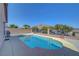 Backyard features a sparkling pool with mountain views, perfect for hot summer days and outdoor enjoyment at 4020 Driscoll Mountain St, Las Vegas, NV 89129