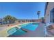 Backyard pool with elevated spa, lounge chairs and mountain views at 4020 Driscoll Mountain St, Las Vegas, NV 89129