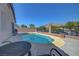 Backyard features a sparkling pool with mountain views, perfect for hot summer days and outdoor enjoyment at 4020 Driscoll Mountain St, Las Vegas, NV 89129