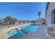 A backyard pool offers a relaxing retreat with a spa and ample patio space for outdoor entertaining at 4020 Driscoll Mountain St, Las Vegas, NV 89129