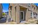 This backyard features a patio, landscaping, and partial shade at 4229 Venus Falls Ave, North Las Vegas, NV 89084
