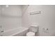 Clean, bright bathroom with a white subway tile shower at 4229 Venus Falls Ave, North Las Vegas, NV 89084