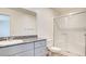 This bathroom features a modern vanity, sink, and shower at 4229 Venus Falls Ave, North Las Vegas, NV 89084