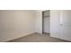 Bedroom with neutral carpet and large closet at 4229 Venus Falls Ave, North Las Vegas, NV 89084