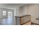 Bright, open-concept kitchen with stainless appliances, granite counters, and patio access at 4229 Venus Falls Ave, North Las Vegas, NV 89084