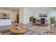 Staged living and dining area with hardwood floors and an open layout at 4229 Venus Falls Ave, North Las Vegas, NV 89084