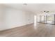 Spacious bedroom with hardwood floors, a ceiling fan, and a large closet at 4301 Fortune Ave, Las Vegas, NV 89107