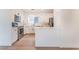 Modern kitchen featuring white cabinets, stainless steel appliances, and light countertops at 4301 Fortune Ave, Las Vegas, NV 89107