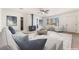 Bright living room featuring a modern fireplace, light walls, and lots of seating at 4301 Fortune Ave, Las Vegas, NV 89107