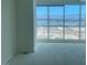 Bright living room with large windows and expansive city views at 4575 Dean Martin Dr # 3206, Las Vegas, NV 89103