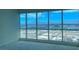 Bright living room with floor-to-ceiling windows offering stunning city views at 4575 Dean Martin Dr # 3206, Las Vegas, NV 89103