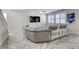 The living room features modern gray furniture, recessed lights, fan and tile floors at 459 Astillero St, Las Vegas, NV 89138