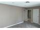 Neutral living room with access to other rooms, freshly painted walls at 461 N Lamb Blvd # H, Las Vegas, NV 89110