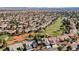 Scenic aerial view of neighborhood homes surrounding a lush golf course at 5133 Burr Oak Dr, Las Vegas, NV 89130