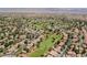 A picturesque aerial view of the community near a golf course in a desert area at 5133 Burr Oak Dr, Las Vegas, NV 89130