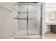 Stylish bathroom with glass-enclosed shower and vanity area, perfect for relaxation at 5133 Burr Oak Dr, Las Vegas, NV 89130