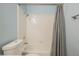 Clean bathroom featuring a shower and bathtub combination with white tiled walls at 5133 Burr Oak Dr, Las Vegas, NV 89130