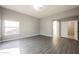Large bedroom with wood floors, neutral walls, and ample natural light at 5133 Burr Oak Dr, Las Vegas, NV 89130