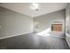 Bright, open bedroom with multiple windows and sleek wood flooring at 5133 Burr Oak Dr, Las Vegas, NV 89130