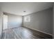 Spacious bedroom boasts hardwood floors and a window letting in plenty of natural light at 5133 Burr Oak Dr, Las Vegas, NV 89130