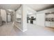 Open layout showcases the kitchen with stylish backsplash and modern stainless steel appliances at 5133 Burr Oak Dr, Las Vegas, NV 89130