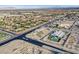 Aerial view of home featuring a modern design, well-maintained landscape, and a private backyard pool at 5400 Mello Ave, Las Vegas, NV 89131