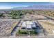 New construction boasts a modern design, professional landscaping, and spacious driveway at 5400 Mello Ave, Las Vegas, NV 89131