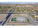 Panoramic aerial view of a modern home, showcasing landscaping, pool, and surrounding neighborhood at 5400 Mello Ave, Las Vegas, NV 89131